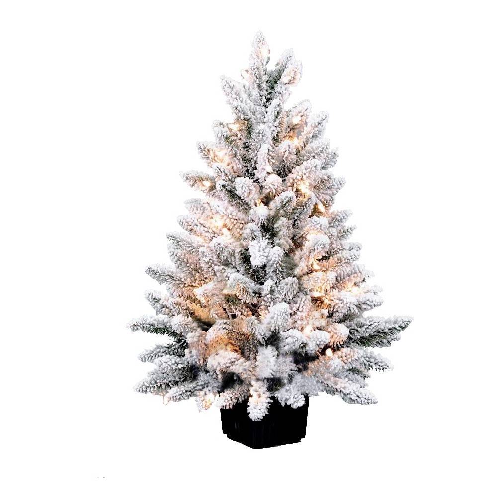 Potted flocked artificial tree